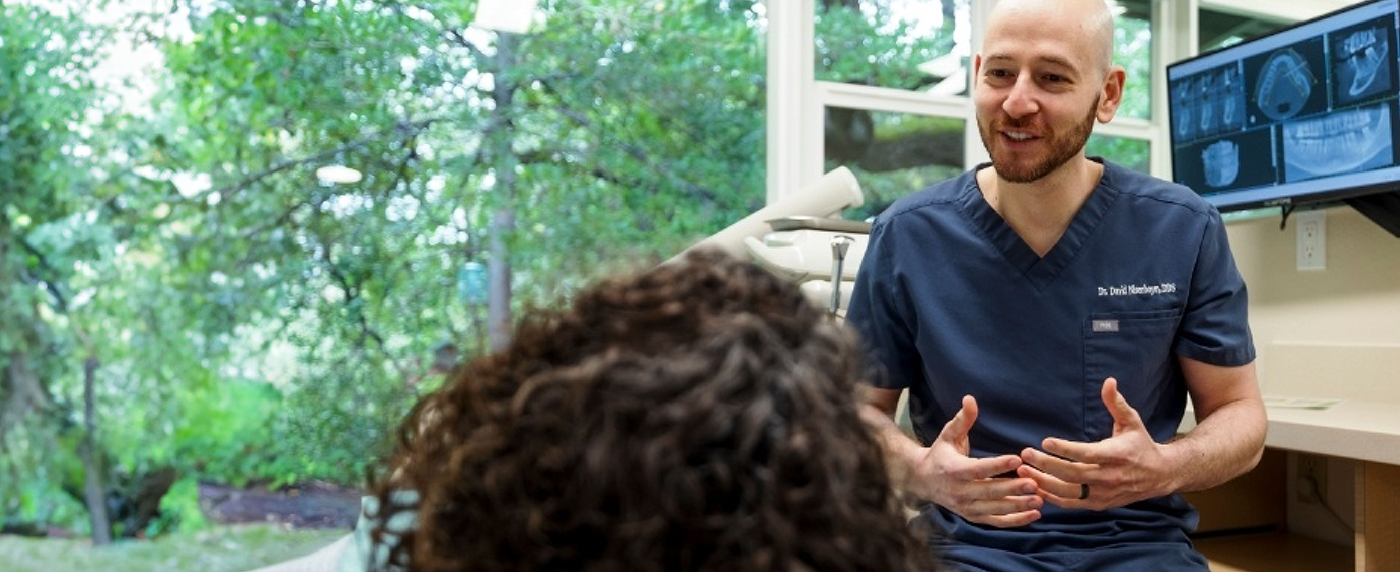 Dentist explaining treatment to patient