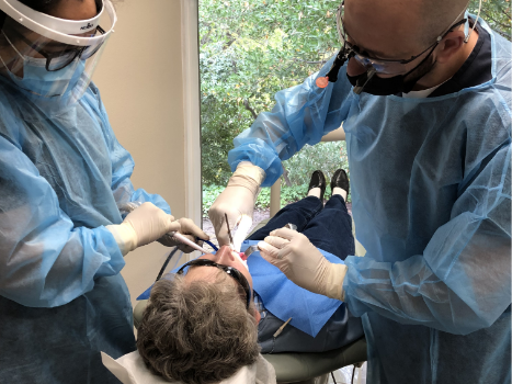 Performing dental implant surgery on a patient