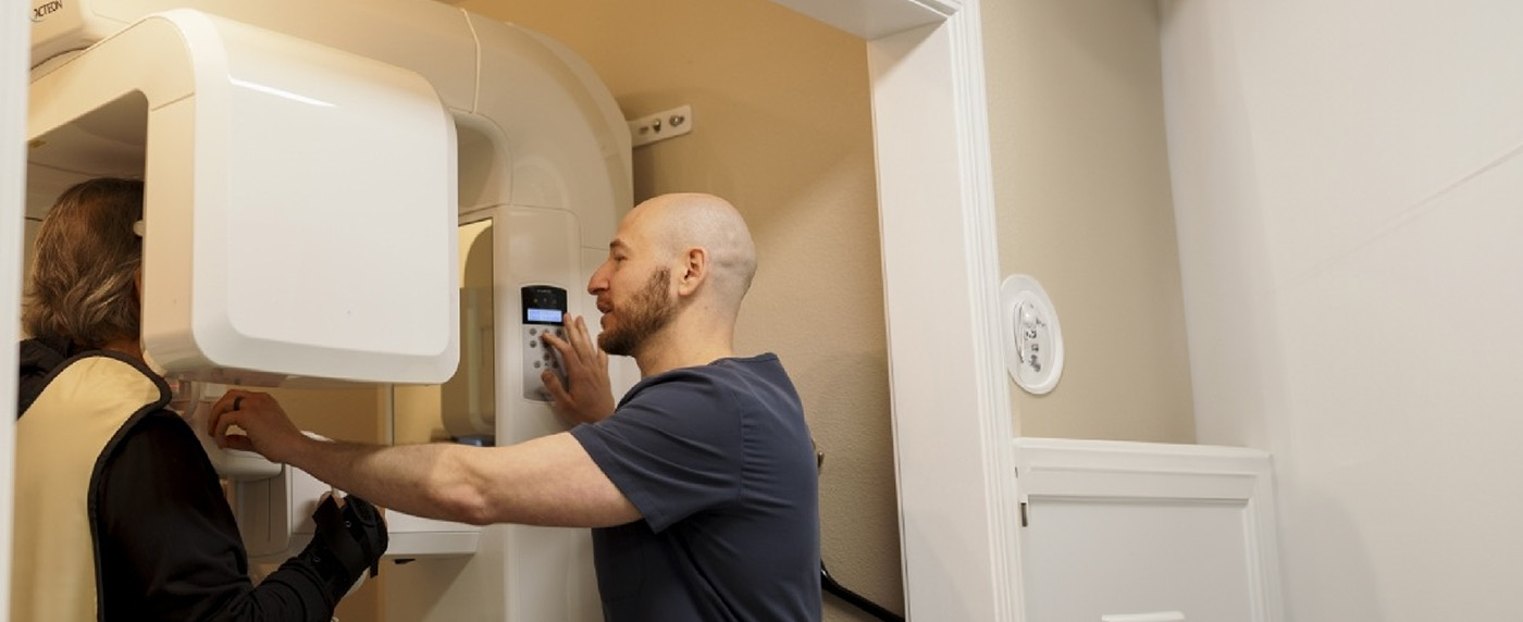 Dentist scanning patients mouth