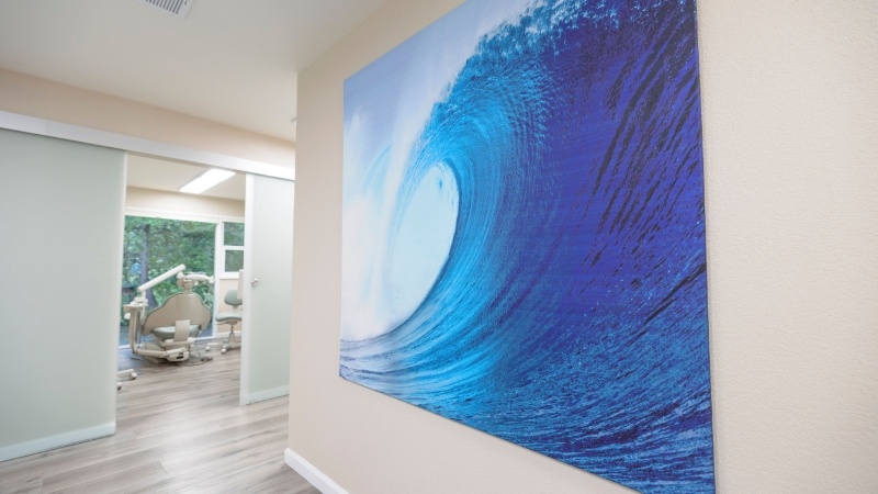 Painting of wave on wall of dental office